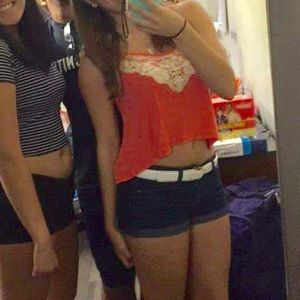 Ruffled salmon colored semi-crop top